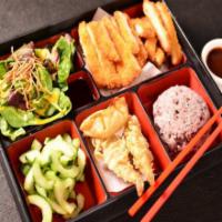 Chicken Katsu Bento · Breaded fried chicken cutlet.  Served with a scoop of rice, side salad, cucumber salad, 2 po...
