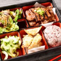 Kal-bi Bento · Kal-bi (BBQ short rib) is marinated and grilled to perfection! Served with a scoop of rice, ...