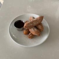 Churros · Comes with a side of Chocolate Sauce