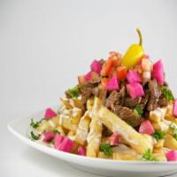 Shawarma Fries · French fries topped with your choice of juicy chicken or beef shawarma, diced tomatoes, pick...
