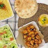 Family Meal - feeds up to 4! · Family Meal includes: 20 pieces of chicken kebab, salad, rice, hummus, and pita bread for 4....