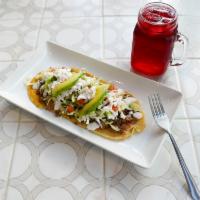 Huaraches de Asada · Steak huaraches. Served with beans, lettuce, tomato, avocado, sour cream and cheese.