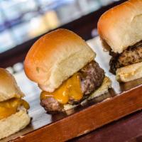 Smash'd Slider Sampler · Three sliders. Angus beef with cheddar cheese, chicken with cheddar cheese and veggie with c...