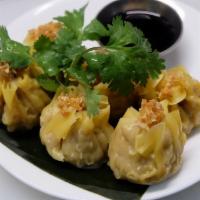 Thai Dumpling · Steamed chicken and shrimp dumpling.