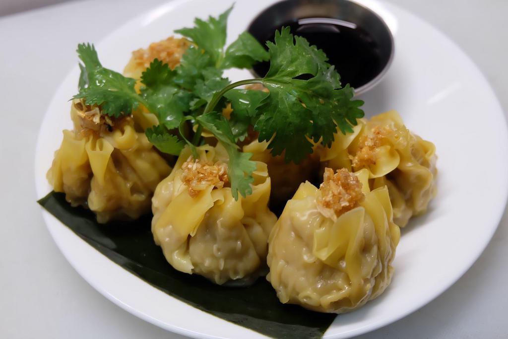 Thai Dumpling · Steamed chicken and shrimp dumpling.