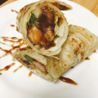 Duck Roll · Homemade crispy duck with lettuce and scallion rolled with roti, served with hoisin sauce.