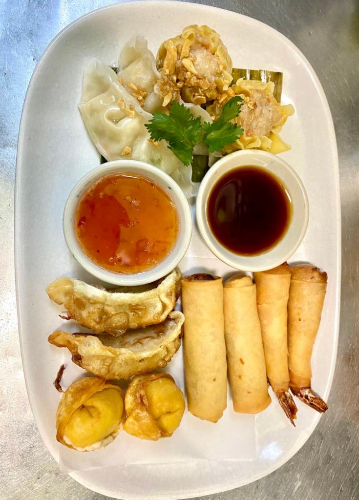 Mixed Appetizers · Spring roll, shrimp roll, Thai dumpling, vegetable dumpling,  chicken gyoza, crab Rangoon