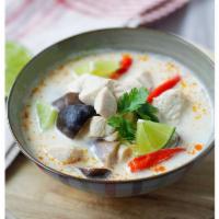 Tom Kha Soup · Coconut milk, galangal, lime juice and mushroom. Spicy.