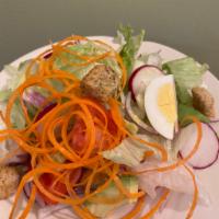 Thai Salad · Egg, lettuce, red onion, radish, tomato, avocado and cucumber with peanut 
dressing.