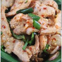 Pork Nam Tok · Grilled pork salad. Celery, mint, scallion, red onion and tomato. Spicy.