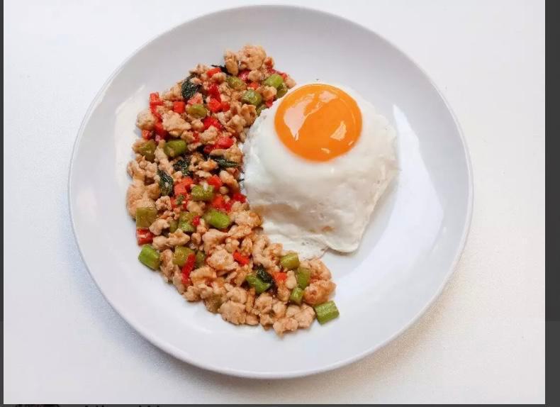Ground Chicken Basil with Fried Egg · Bell pepper, onion, basil, long hot chili, garlic and chili. Spicy.