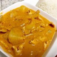 Massaman Curry · Coconut milk, onion, peanut butter, potato and carrot. Spicy.