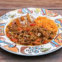 Bistec Ranchero · Sauteed dice beef with onion and tomatoes in special ranchero sauce. 