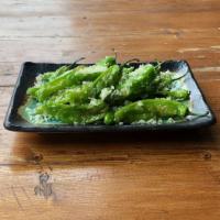 Shishito Peppers · Tossed in yuzu salt and lemon juice, sprinkled with tempura flakes. Spicy.