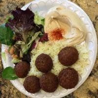 Mini Falafel · 3 balls of falafel served with rice, salad, hummus, and a pita.