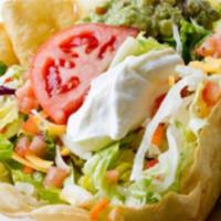 Vegetarian Taco Salad · Vegetarian. Crispy flour tortilla shell. Filled with fresh lettuce, spinach tomatoes, cheese...