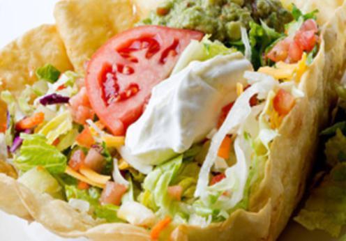 Vegetarian Taco Salad · Vegetarian. Crispy flour tortilla shell. Filled with fresh lettuce, spinach tomatoes, cheese, zucchini, yellow squash, onions, corn, bell peppers, and celery.