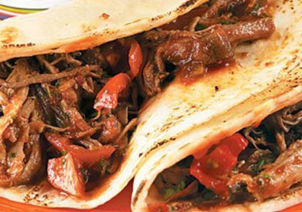 2 Brisket Tacos · Served with rice and beans. Sautéed with tomatoes, onions, sliced poblano, and bell peppers. Saved with bean soup.