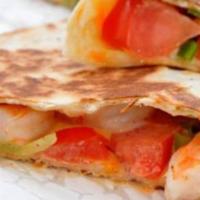 Shrimp Quesadillas · 3 quesadillas served with guacamole and sour cream. Filled with grilled shrimp.