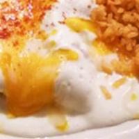 Sour Cream Enchilada Plate · Served with rice and beans. Topped with sour cream sauce.