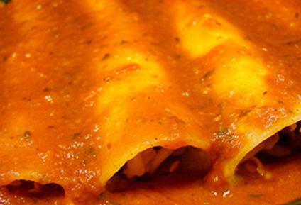 3 Vegetarian Enchiladas ·  Served with rice and beans. Filled with zucchini, yellow squash, onions, corn, bell peppers, and celery, topped with ranchero sauce.