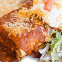 Regular Chimichanga · Served with rice, beans, and sour cream. Topped with your choice of sauce. A deep-fried extr...
