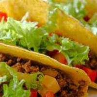 Family Regular Tacos · 8 tacos served with salad, a pint of rice, a pint of beans, a pint of hot sauce, chips, and ...