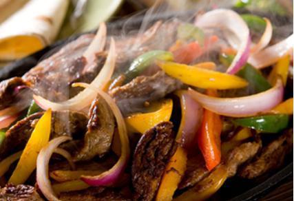 Family Fajitas · Choice of beef, chicken or combination, served with rice, beans, tortillas, sour cream and pico de gallo.