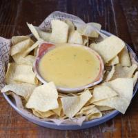 Chile con Queso - Snacks · A blend of cheese with fire-roasted chiles & tomatoes, tortilla chips [Vegetarian]