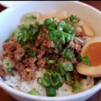 Tan tan Don · Spicy Ground pork over rice with bamboo shoots and 1/2 soft boiled egg. 