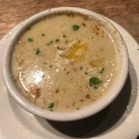 New England Clam Chowder · bowl of home made new england style clam chowder.