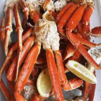 Snow Crab Leg Clusters · (1 lb) w/ garlic butter, served with side of rosemary potatoes