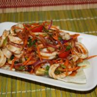 Squid Salad · Squid with cucumber, tomato, onion, cilantro in spicy lime juice. Hot and Spicy.  
