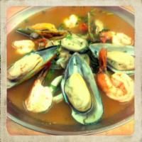Hot Pot Mixed Seafood Talay · Mussels, shrimps, calamari and tilapia fillet served in hot sour spicy soup.