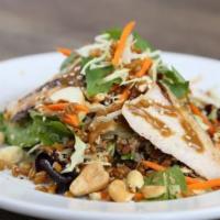 Sesame Chicken Grain Bowl · Grilled chicken breast, peanuts and cashews on mixed greens and cabbage. Tossed with carrots...