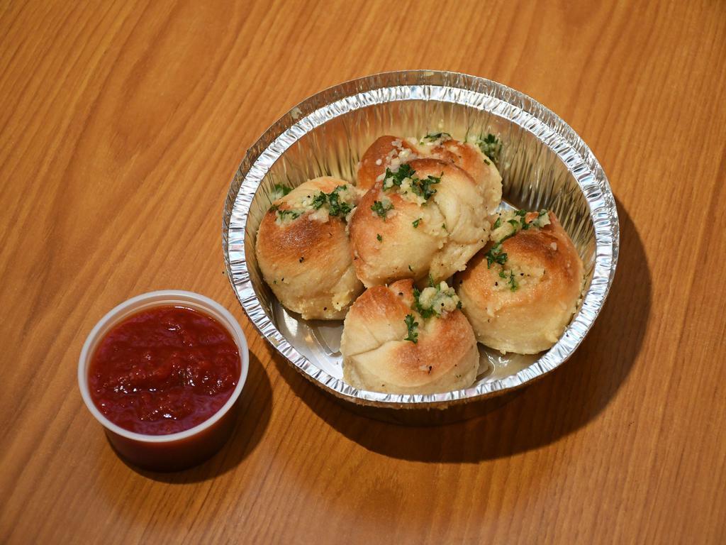 Garlic Knots with Sauce · 5 pieces. Marinara sauce on the side.