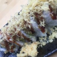 Crunchy Roll · Shrimp tempura & krab inside. Tempura flakes and eel glaze on top.