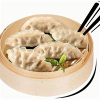 Steamed BEEF Dumpling · BBQ beef flavor steamed Dumpling ....it comes with 5 big pieces and home made  dumpling sauce