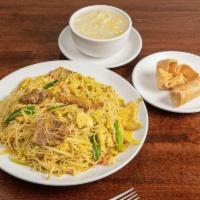 Singapore Rice Noodles · Chicken, beef, pork and shrimp rice noodles stir fired in curry sauce.
