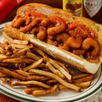 Seafood Po'Boys · A fresh baguette lathered with our homemade Thousand Island, fresh lettuce & sliced tomatoes...