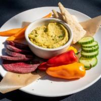 Zesty Garlic Hummus · extra garlicky hummus with sweet peppers, cucumbers, carrots, beets, & pita for sharing