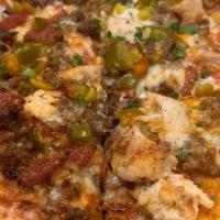 CARNIVORE · ground beef, prosciutto, sopressata, pepperoni, shredded mozzarella cheese, bacon, spicy che...