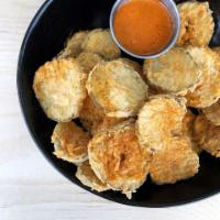 FATS' Pickles · #LiveHappy - Fried pickle chips, cajun seasoning, and chipotle aioli. Spicy.