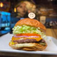 The Classic · #LiveHappy - 1/4 lb. beef patty, cheddar, tomato, onion, pickle, lettuce, and SF sauce on Ha...