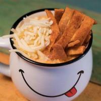 Spicy Latina · Creamy chicken tortilla soup, tortilla strips, pepper Jack and cheddar. Signature soups made...