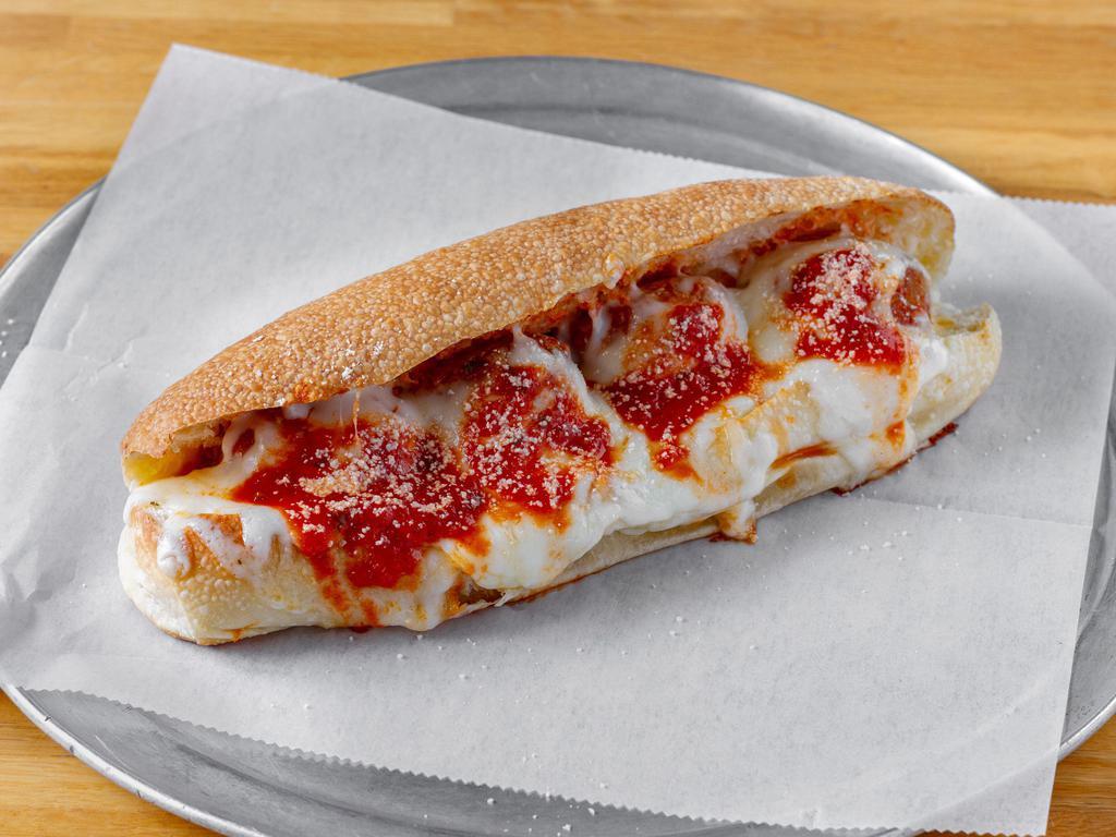Homemade Turkey Meatball Sub · Our family recipe turkey meatballs, slow cooked in our housemade tomato sauce, topped with mozzarella, served hot on a homemade sub roll.