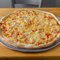 Crab Dip Pizza · A maryland original! our creamy crab dip, sliced tomatoes, fresh corn and mozzarella with a ...
