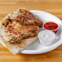 Chicken & Crab Quesadilla · Homemade crab dip with chicken breast, mozzarella and cheddar cheeses. Served with a side of...
