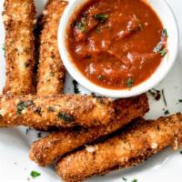 Homemade Mozzarella Sticks · Served with homemade marinara sauce.