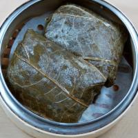 22. Sticky Rice with Pork Wrapped in Lotus Leaf · 2 pieces.